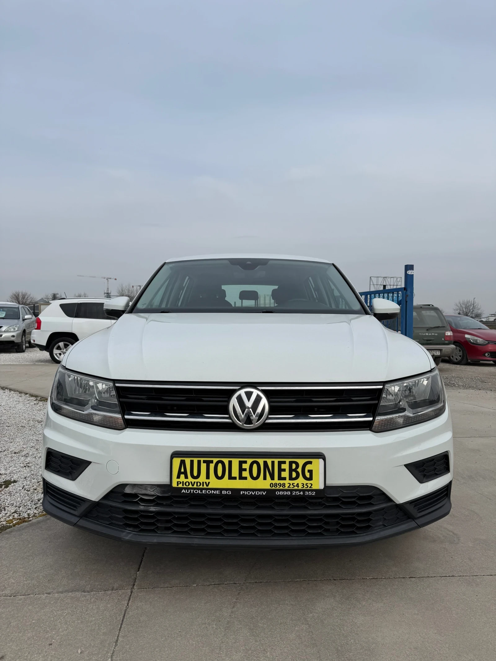 VW Tiguan 1.6 TDi, снимка 2 - Автомобили и джипове - 54365757