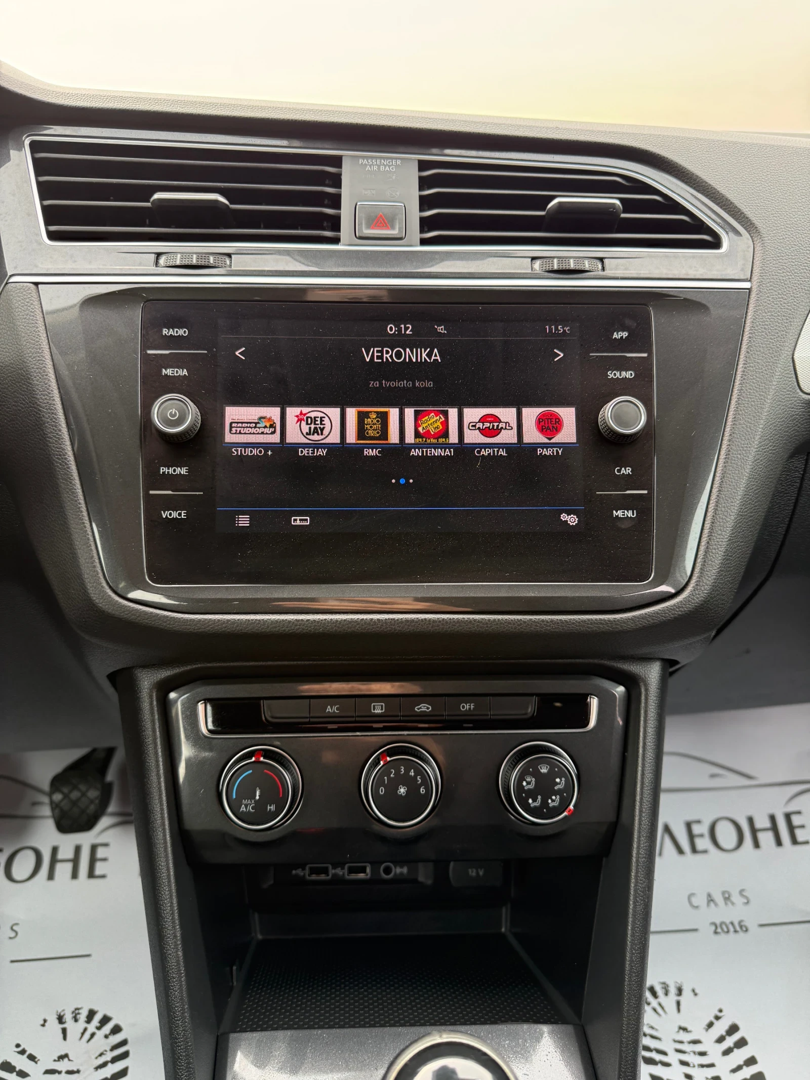 VW Tiguan 1.6 TDi, снимка 11 - Автомобили и джипове - 54365757