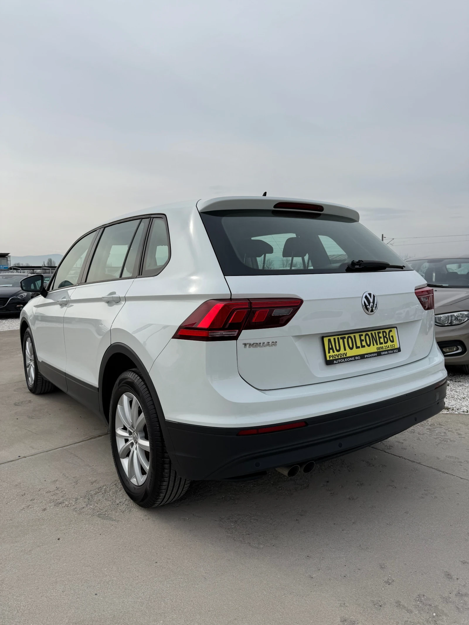 VW Tiguan 1.6 TDi, снимка 4 - Автомобили и джипове - 54365757