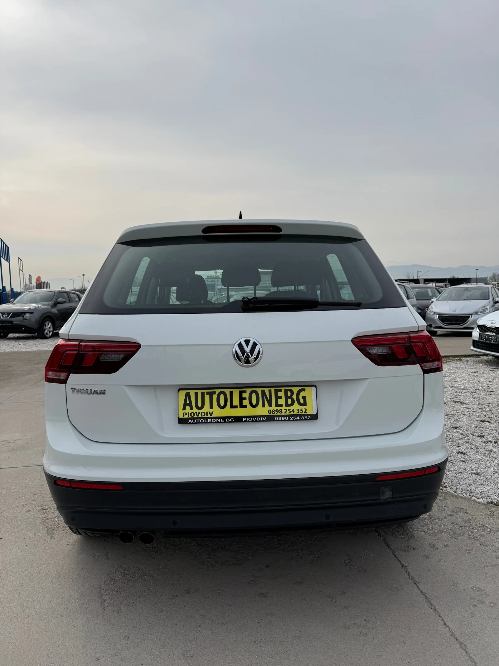 VW Tiguan 1.6 TDi, снимка 5 - Автомобили и джипове - 54365757
