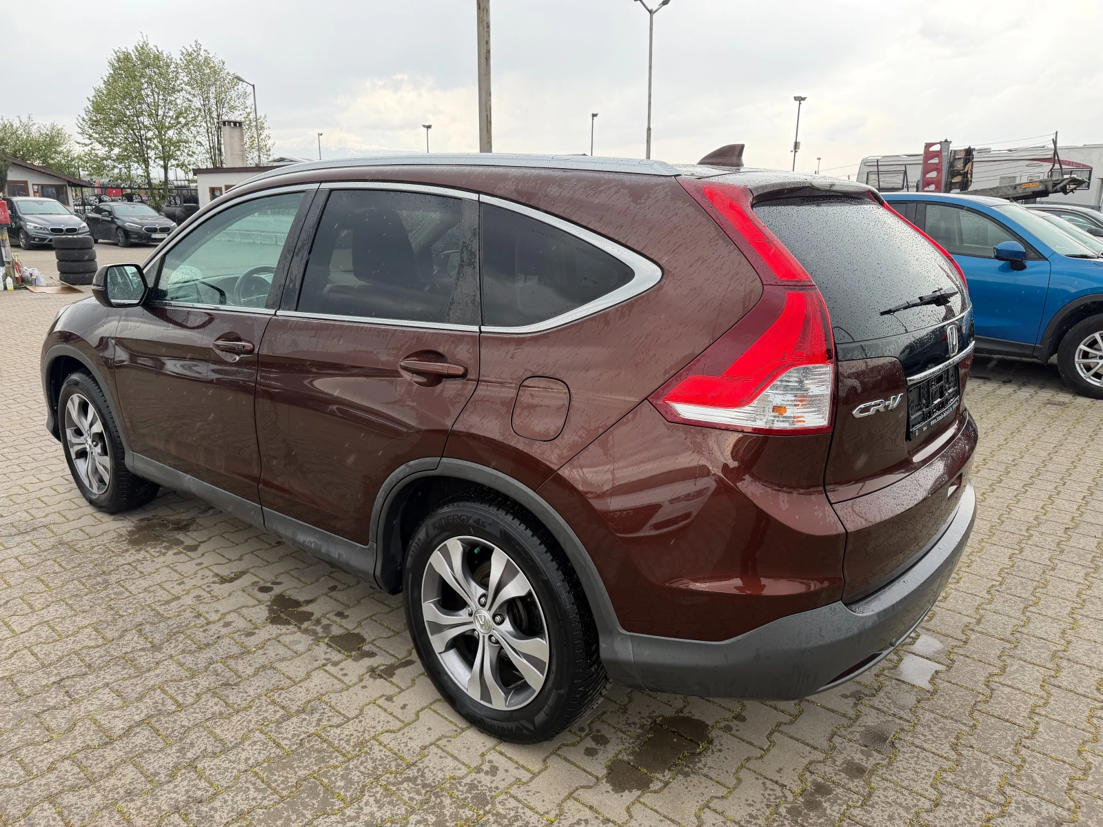Honda Cr-v 2.0i-VTEC 4WD AVTOMAT/NAVI/PANORAMA/KOJA EURO 5, снимка 8 - Автомобили и джипове - 54367064