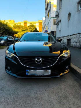 ������ Mazda 6