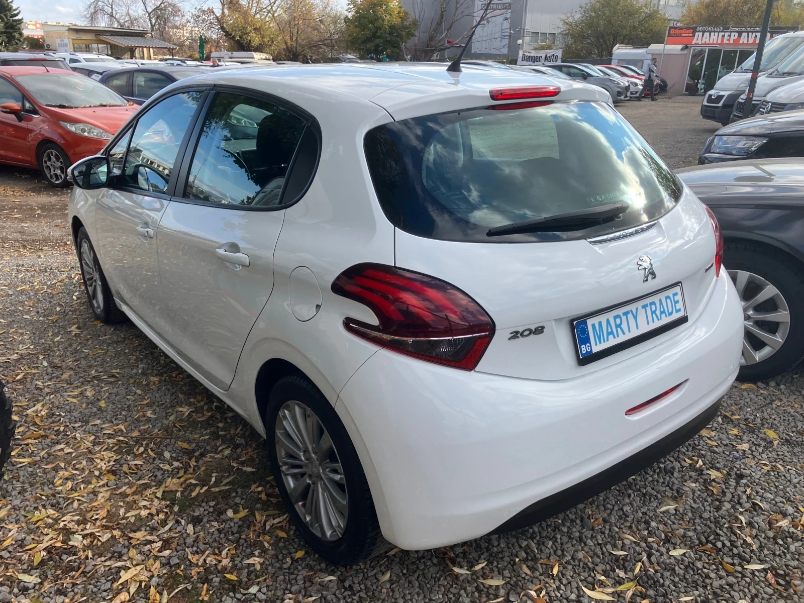 Peugeot 208 1.2i-Allure-eur6b - изображение 4