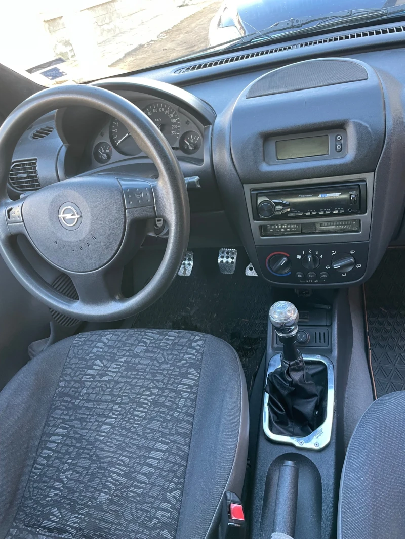 Opel Corsa 1.2 16v, снимка 7 - Автомобили и джипове - 49158387