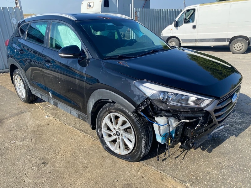 Hyundai Tucson 2.0 CRDI 4x4, снимка 2 - Автомобили и джипове - 37850059