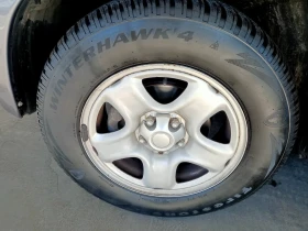 Гуми с джанти Firestone 215/70R16, снимка 1