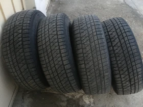 Гуми Зимни 245/70R16, снимка 8 - Гуми и джанти - 48881359