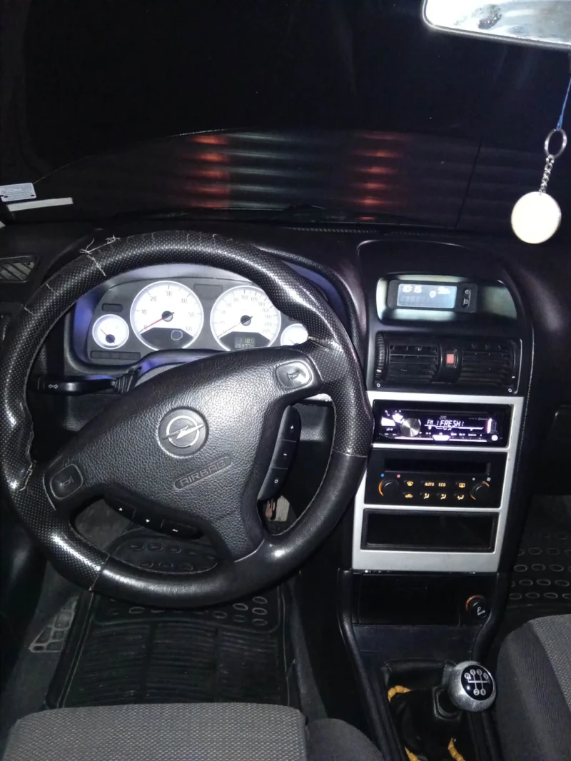 Opel Astra, снимка 10 - Автомобили и джипове - 53577682