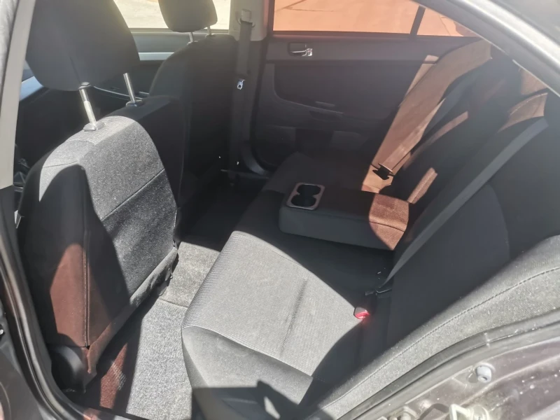 Mitsubishi Lancer 1.8 MIVEC Swiss, снимка 12 - Автомобили и джипове - 50002638