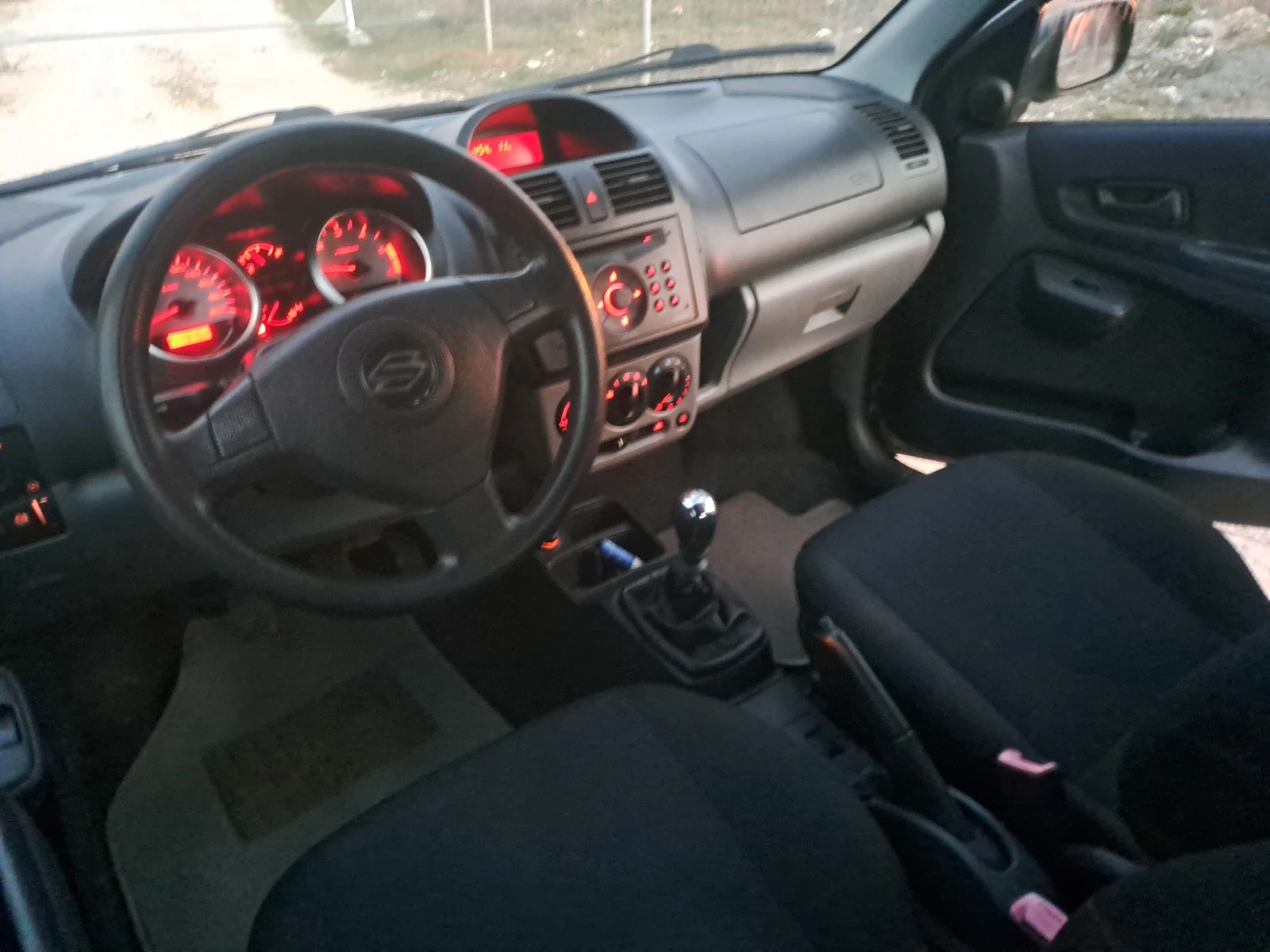Suzuki Ignis 1.3i ESKLUZIVE SPEZIALL, снимка 11 - Автомобили и джипове - 53880702