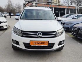 VW Tiguan 1.4TSI* 4MOTION* EURO5B* NAVI*  - 8200 € / 16037.81 лв. - 94334199 2
