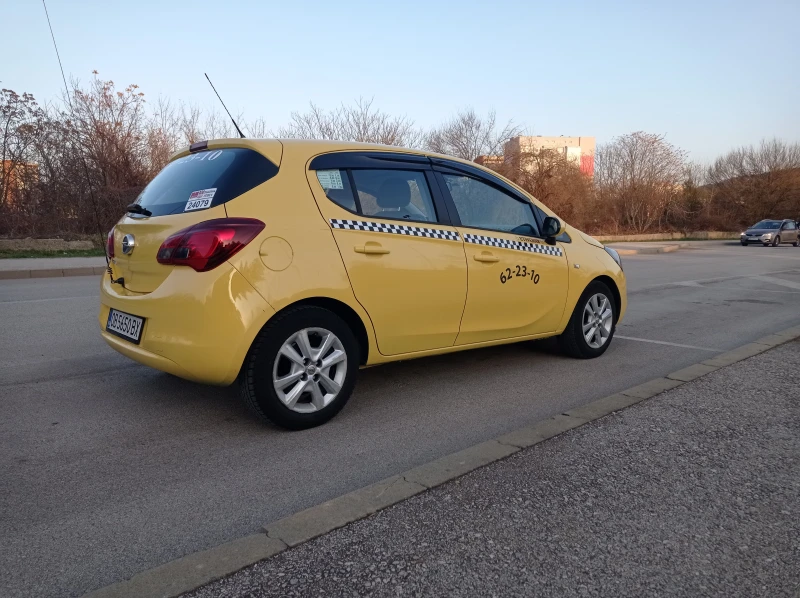 Opel Corsa Е.1.4/90кс., снимка 11 - Автомобили и джипове - 48047684