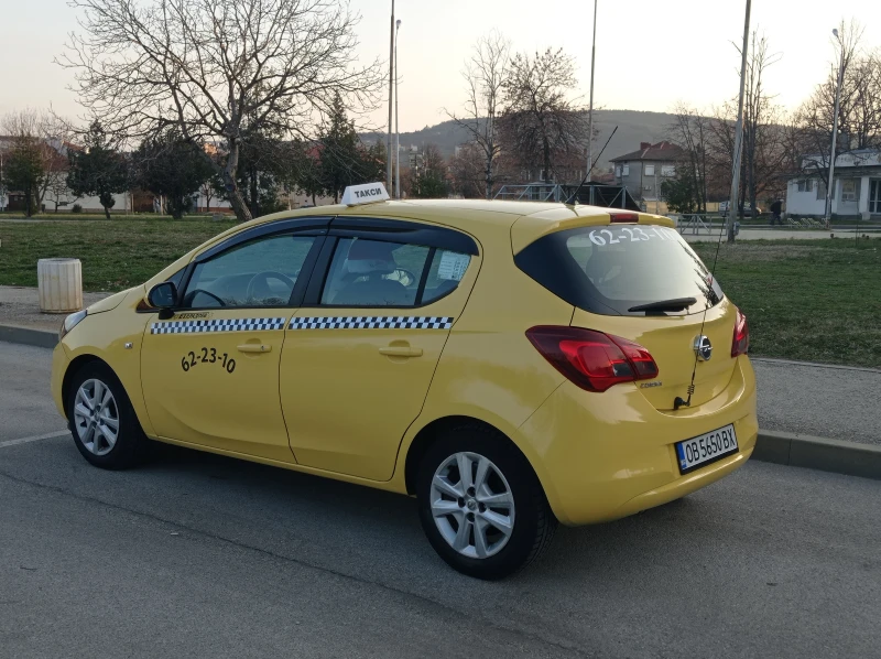 Opel Corsa Е.1.4/90кс., снимка 7 - Автомобили и джипове - 48047684