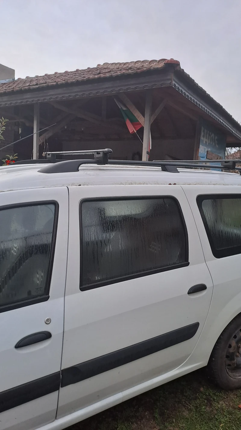 Dacia Logan, снимка 10 - Автомобили и джипове - 52794643