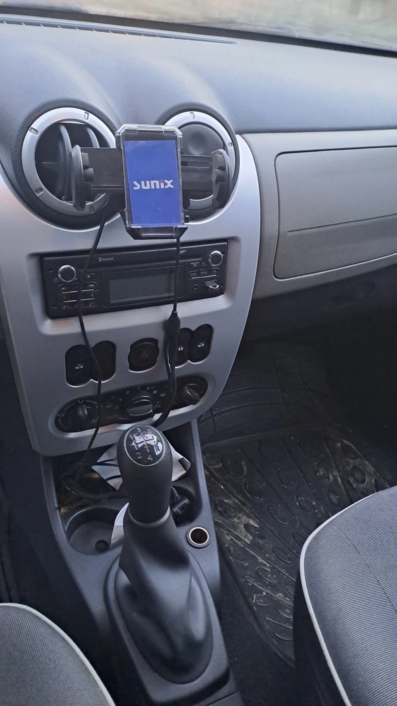 Dacia Logan, снимка 8 - Автомобили и джипове - 52794643