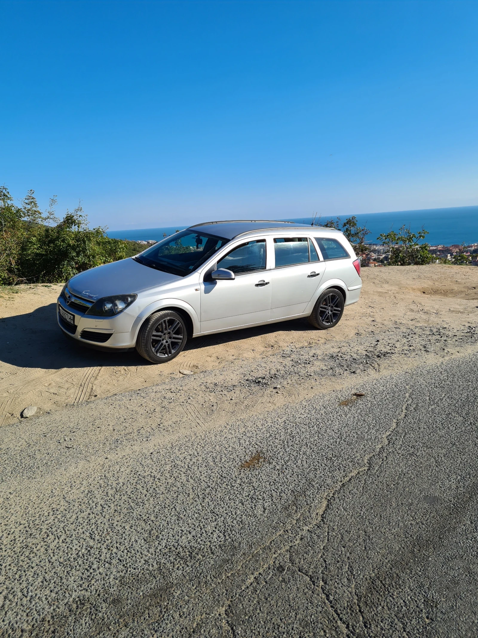 Opel Astra, снимка 14 - Автомобили и джипове - 55789747