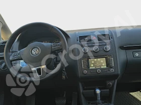 VW Touran 1.4/DSG/Tsi/Navi/Phone - 6299 € / 12319.77 лв. - 93425918 13