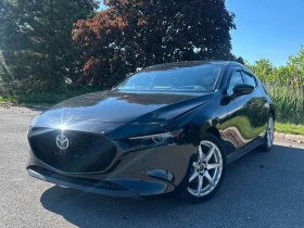 ������ Mazda 3