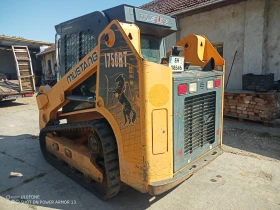 Мини челни товарачи GEHL Мустанг 1750RT, снимка 1
