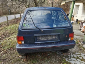 Kia Pride 1, 3