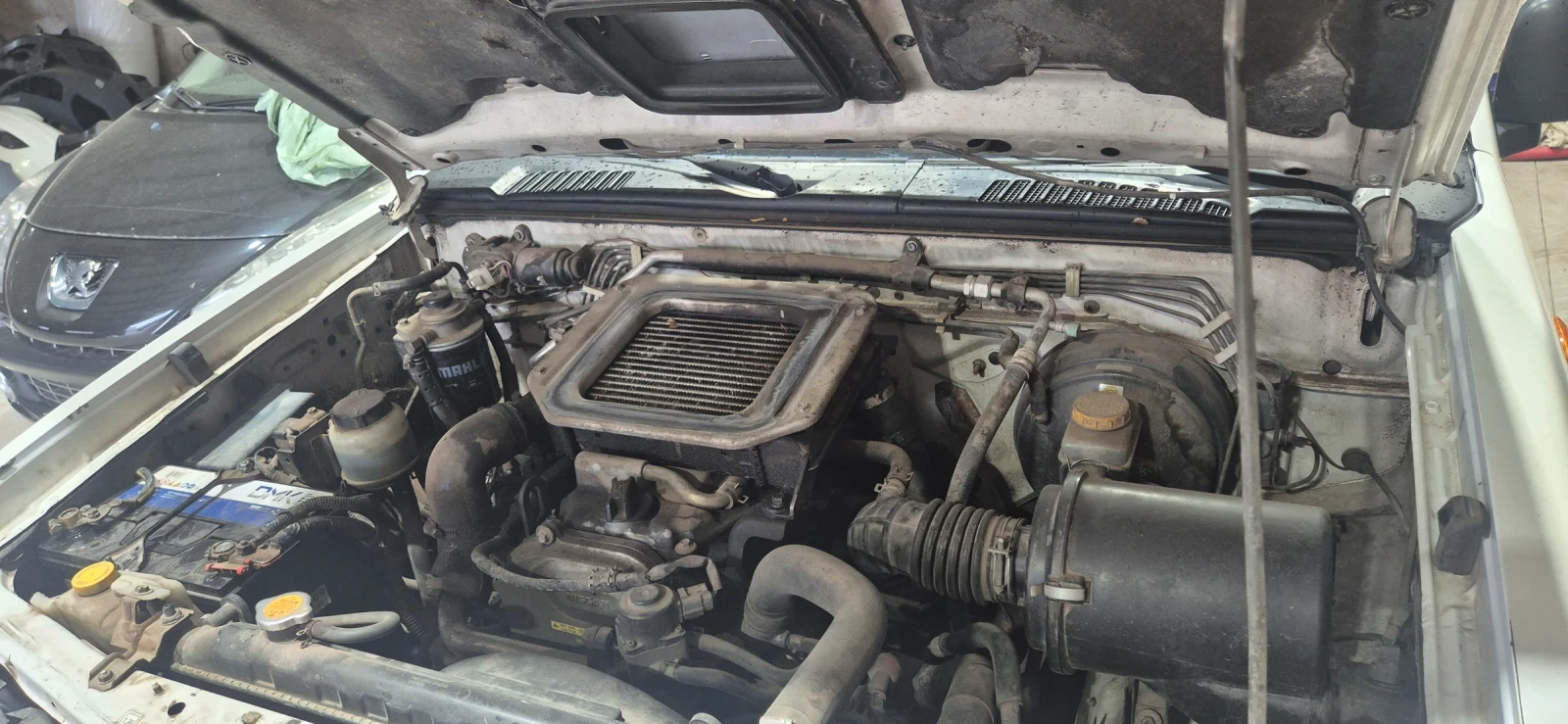 Nissan Navara YD25, снимка 8 - Автомобили и джипове - 54456101