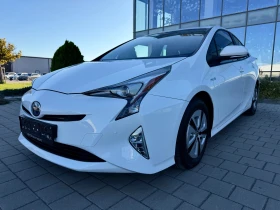 Toyota Prius С.КНИЖКА-KEYLESS-JBL-HEAD-UP-КАМЕРА-DISTRONIC-
