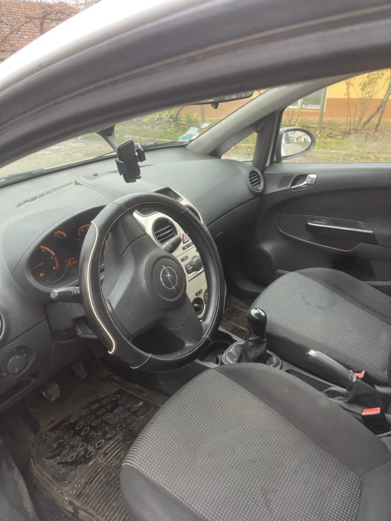 Opel Corsa 1.3, снимка 7 - Автомобили и джипове - 48467769