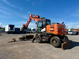 Багер Hitachi Zaxis 140W, снимка 1