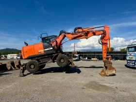 Багер Hitachi Zaxis 140W, снимка 8