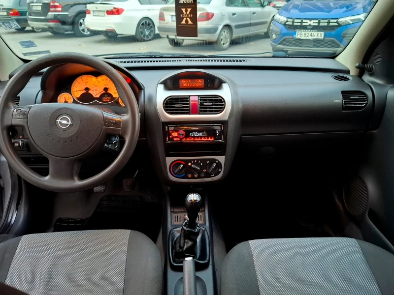 Opel Corsa 1.3 TDCI, снимка 8 - Автомобили и джипове - 48253455