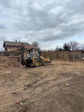 Багер Caterpillar 428b