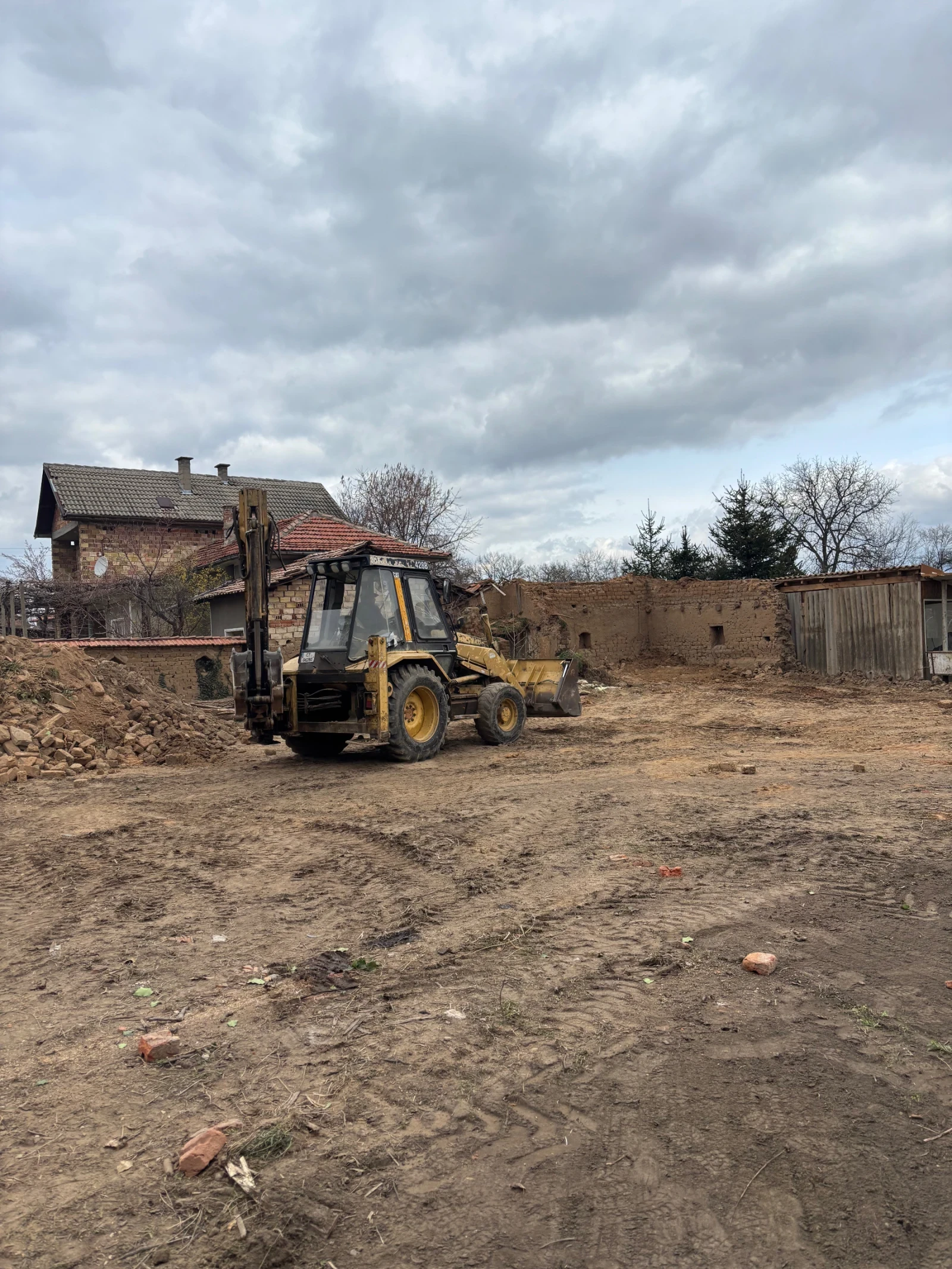 Багер Caterpillar 428b