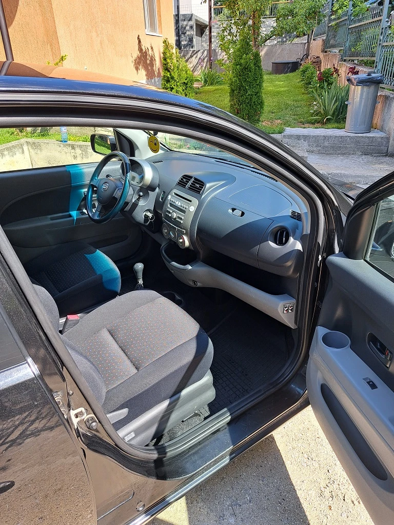 Daihatsu Sirion, снимка 10 - Автомобили и джипове - 52939313