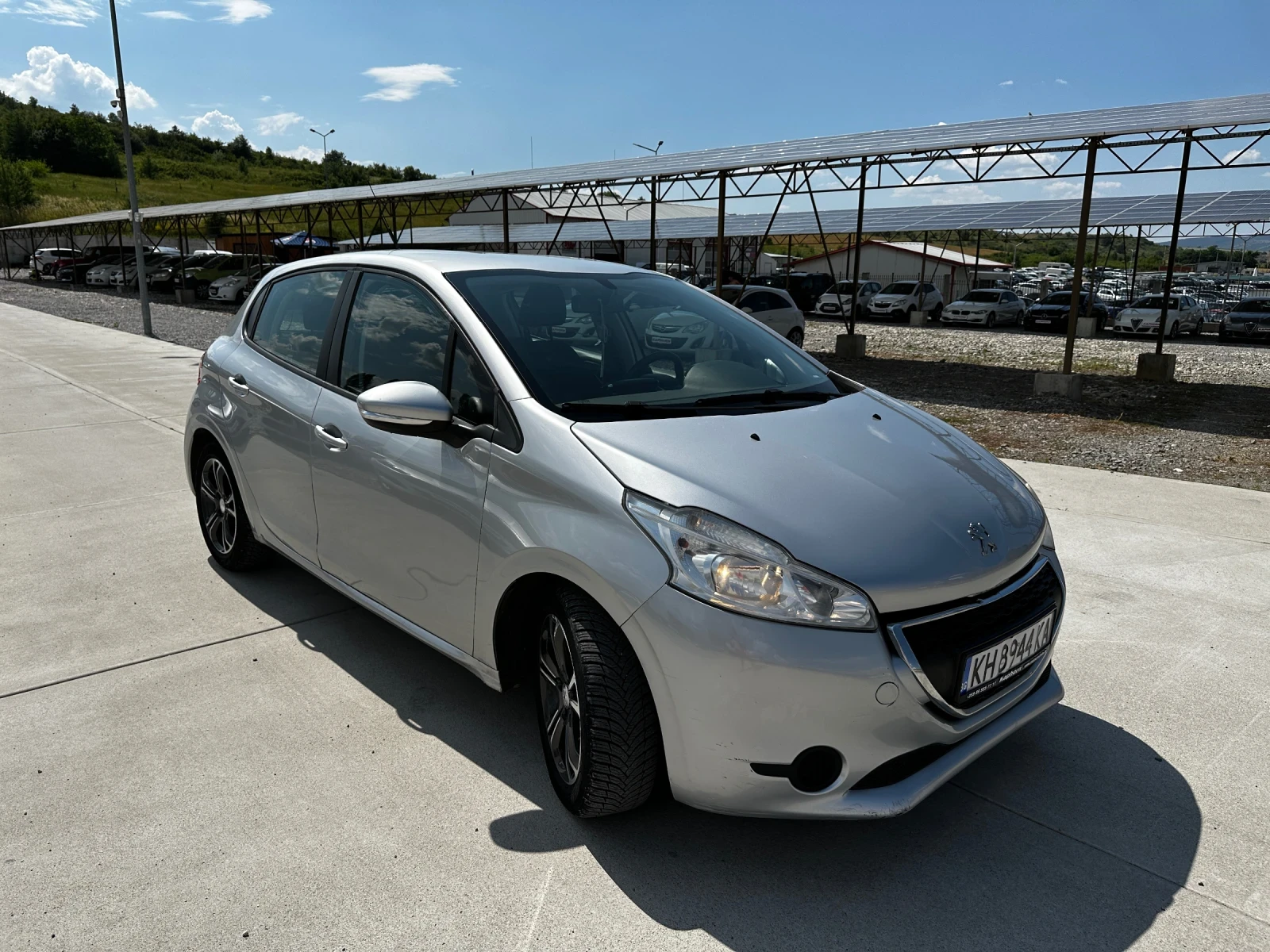 Peugeot 208 1.4HDI , снимка 11 - Автомобили и джипове - 55509165
