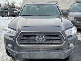 Toyota Tacoma 4WD Double Cab | ПОДГРЕВИ | LANE ASSIST | CARFAX - 20500 € / 40094.51 лв. - 52313105 6