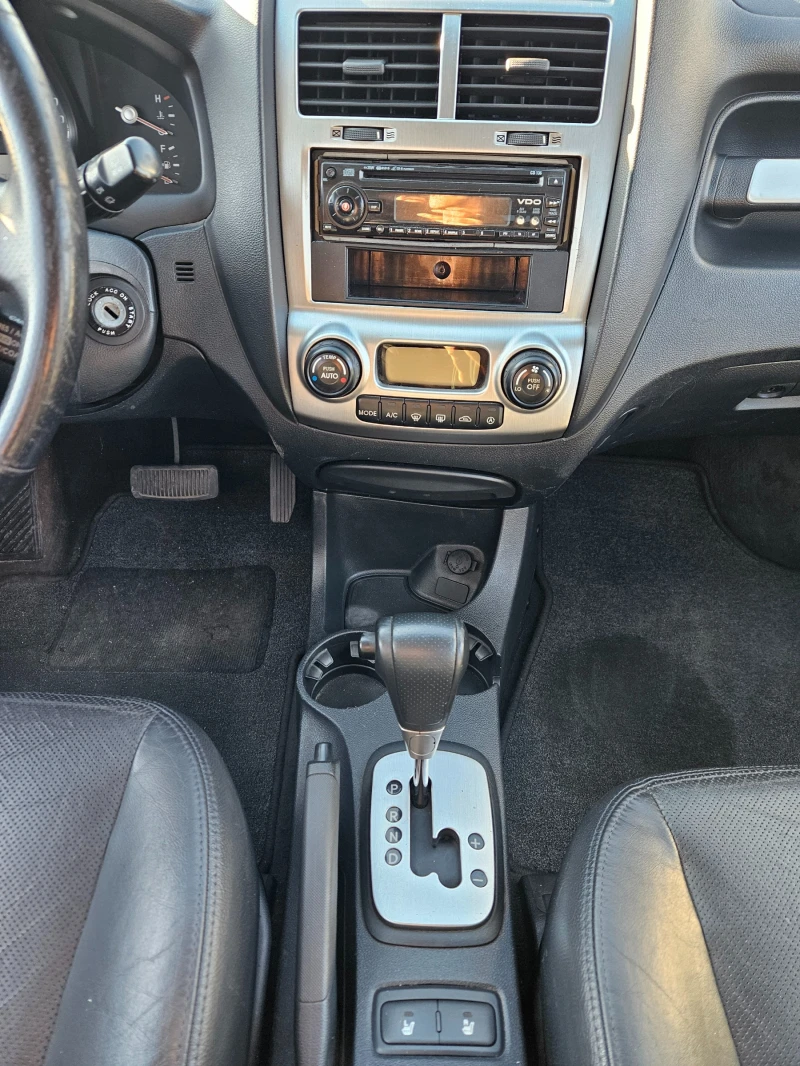 Kia Sportage 2, 0 CRDI 4x4, снимка 8 - Автомобили и джипове - 53106318