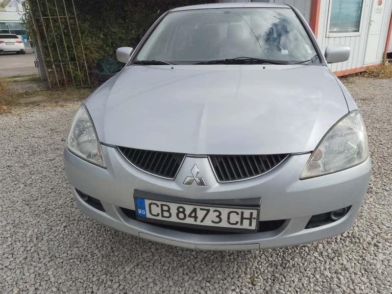 Mitsubishi Lancer 1.6i BiFuel УНИКАТ, снимка 7 - Автомобили и джипове - 51955401
