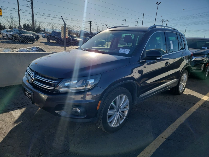 VW Tiguan SE* Подгрев* Navi* Keyless* , снимка 1 - Автомобили и джипове - 48994913