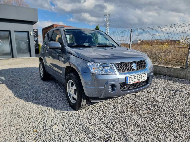 Suzuki Grand vitara 1.6i 16V 4X4 КЛИМАТРОНИк, снимка 4 - Автомобили и джипове - 52501831