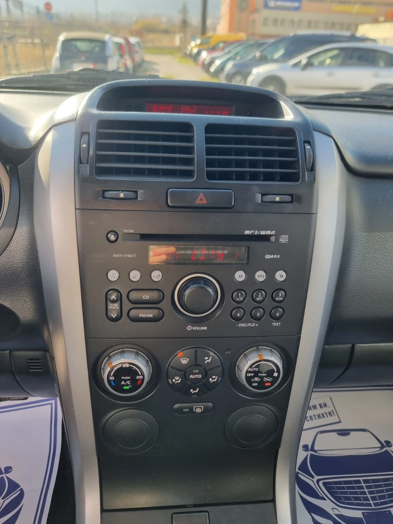 Suzuki Grand vitara 1.6i 16V 4X4 КЛИМАТРОНИк, снимка 9 - Автомобили и джипове - 52501831