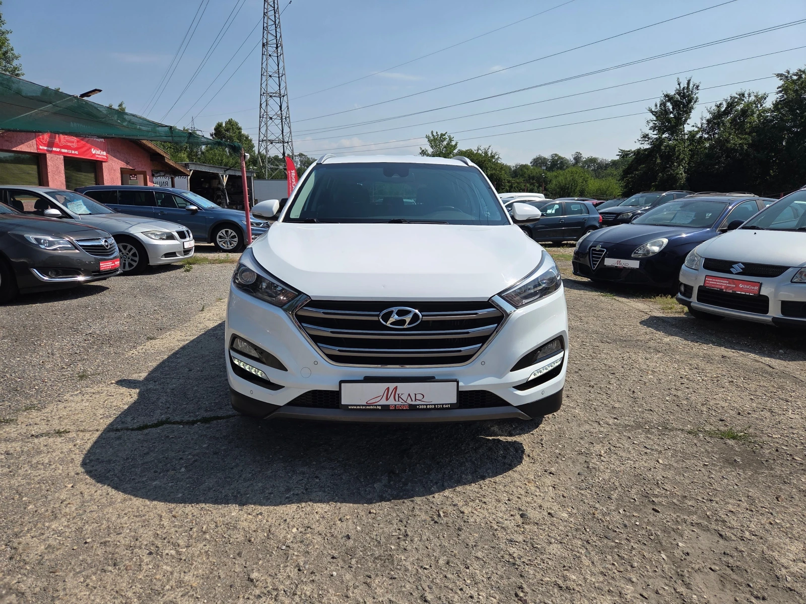 Hyundai Tucson 2.0CRDI/4X4, снимка 2 - Автомобили и джипове - 55362946