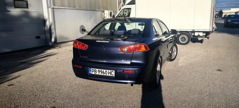 Mitsubishi Lancer 1.5 с газова уредба, снимка 13 - Автомобили и джипове - 48057649