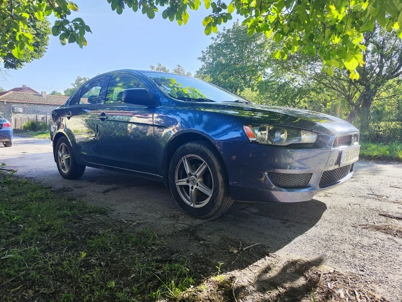 Mitsubishi Lancer 1.5 с газова уредба, снимка 4 - Автомобили и джипове - 48057649