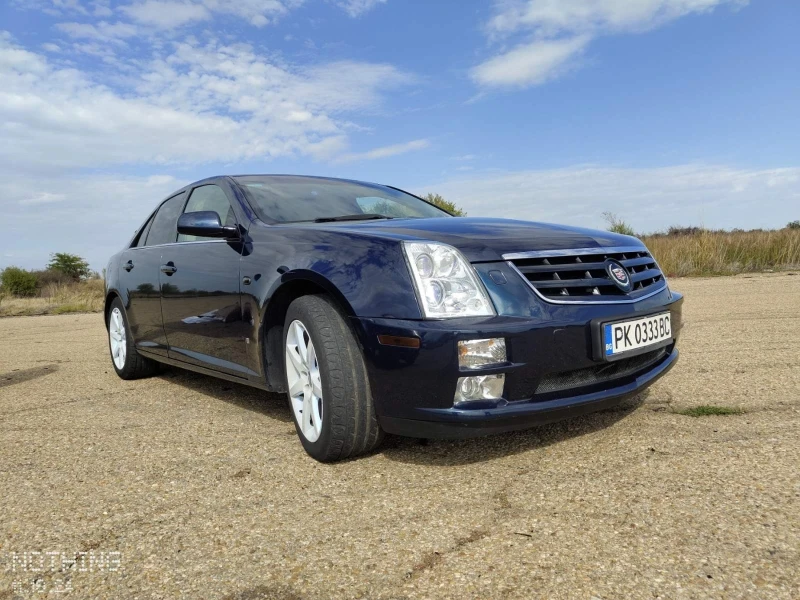 Cadillac STS, снимка 1 - Автомобили и джипове - 48255894