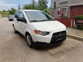 Mitsubishi Colt 1.3 16 v klima - изображение 1