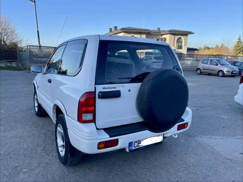 Suzuki Grand vitara, снимка 7 - Автомобили и джипове - 52395054