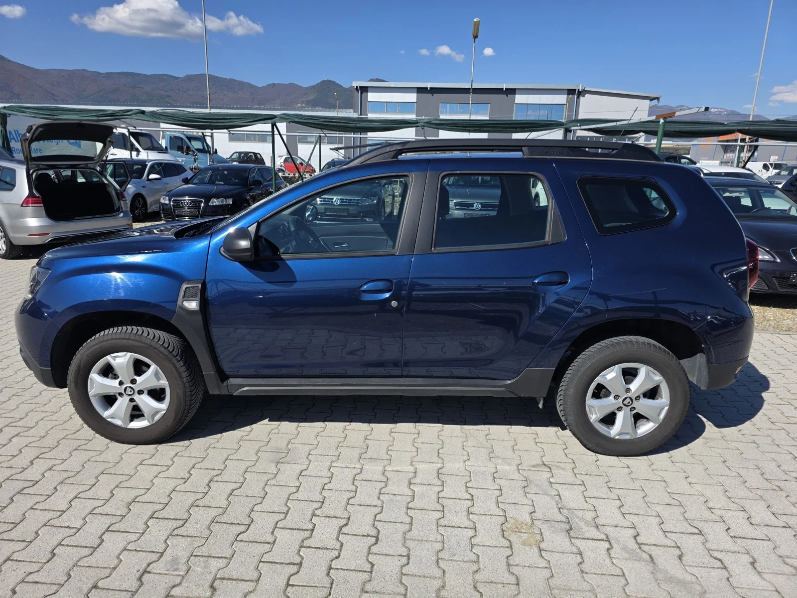 Dacia Duster 1.6i EURO 6C Лизинг, снимка 4 - Автомобили и джипове - 54109613
