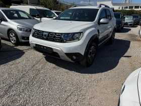 Dacia Duster 1.6 LPG 114hp* TV+ DVD* КОЖА* ПОДГРЕВ* КАМЕРА, снимка 16