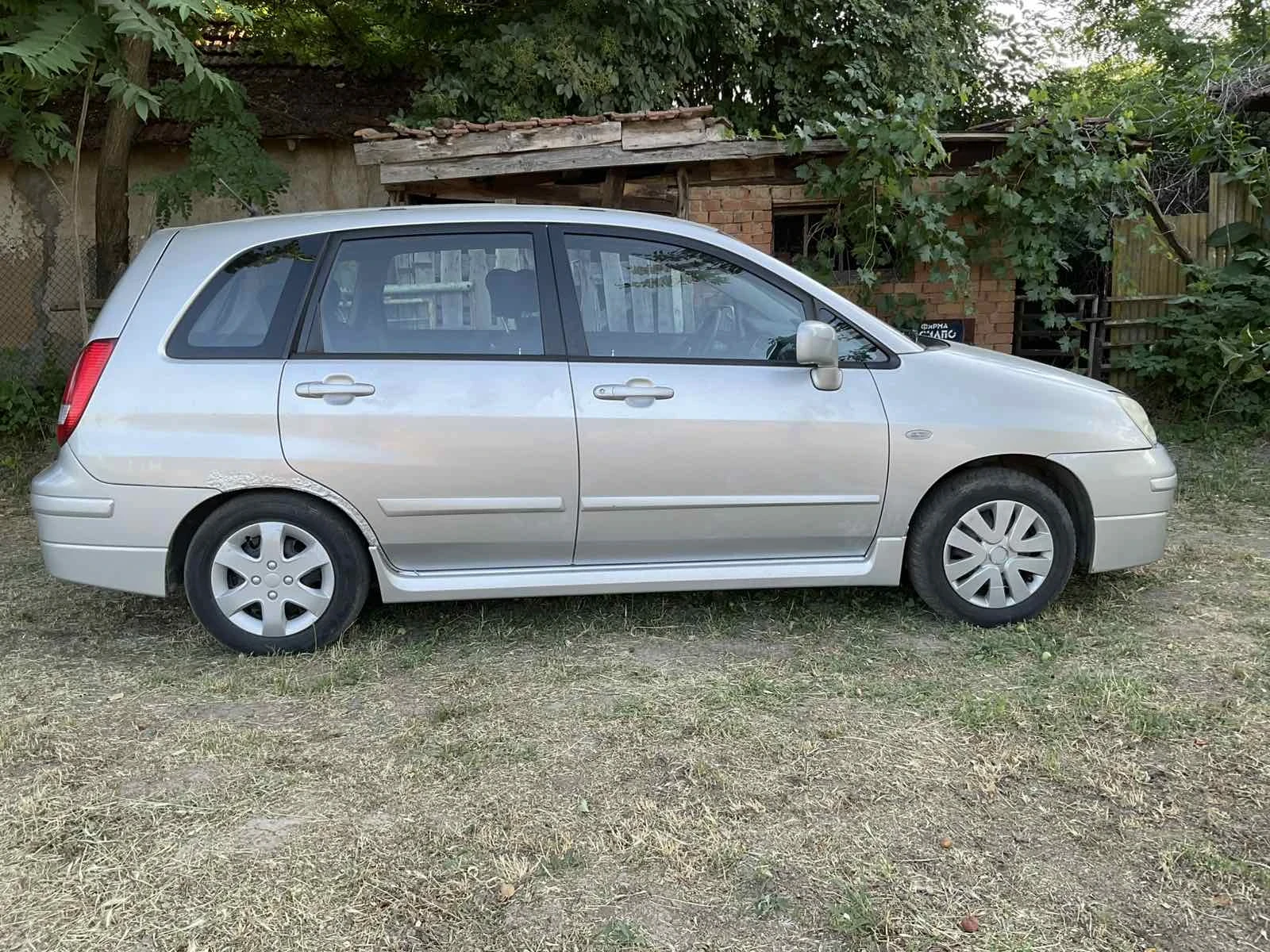 Suzuki Liana 1.6 - изображение 7