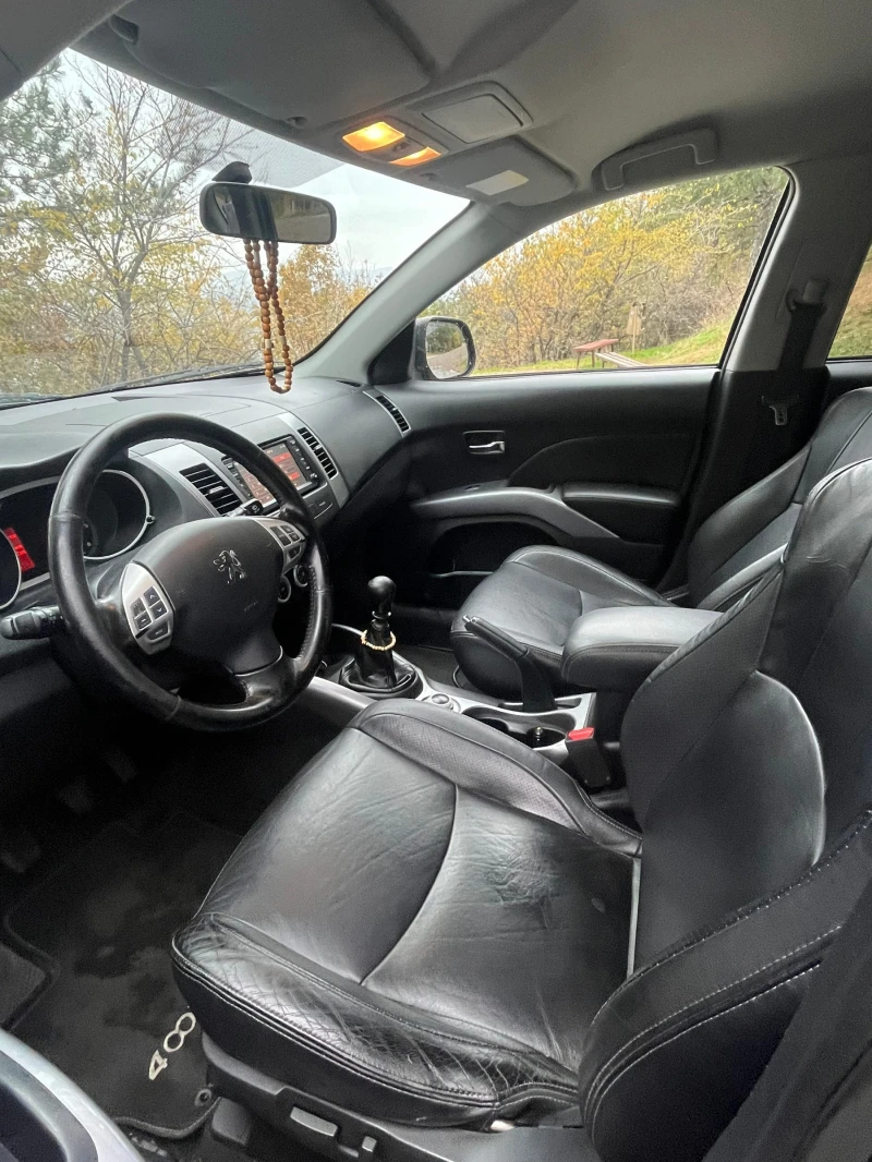 Peugeot 4007 2.2 HDI 156 к.с., кожа, 4х4, навигация, 7 места, снимка 12 - Автомобили и джипове - 52342799